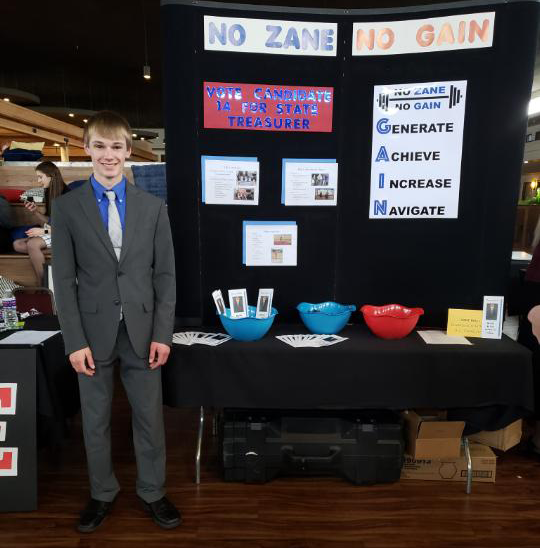 Zane Rikli campaign booth for State Treasurer crpped